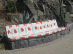 Decorated stone bench on way toPlaya La Madera