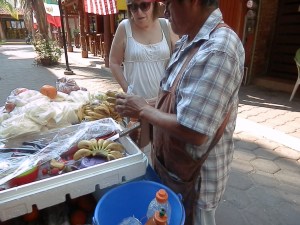 Sylvia buying bananas