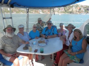 The Captains and guests on the Rapsculion, Pam far right, Henry back 4th in