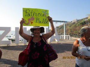 Faye holding the sign to assemble our group